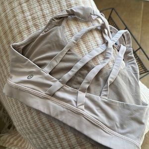 Light pink Lululemon sports bra